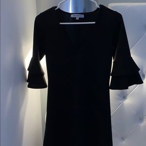 Vanity room black shoulder flare dress,